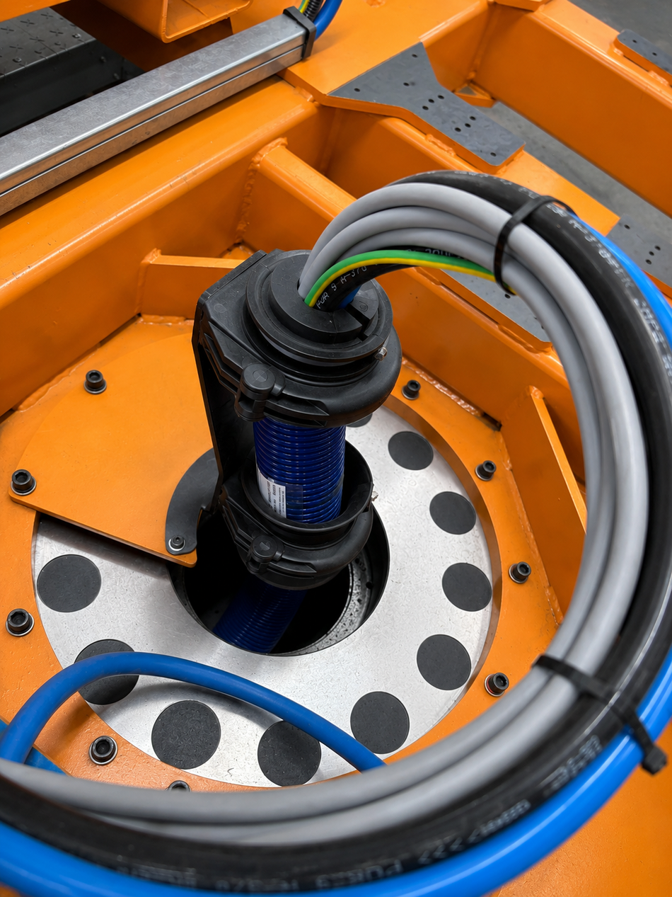 Rotary Table Energy Package for Automotive Production Complete BizLink rotary table dresspack and energy package installed in an automotive body shop for reliable cable and hose management.