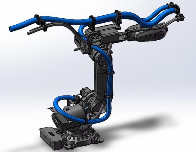 Industrial robot with BizLink top-mounted cable management system for robotic laser welding applications