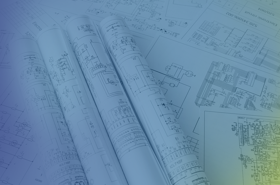 Rolled electrical engineering schematics with detailed circuit diagrams and technical drawings for industrial automation systems