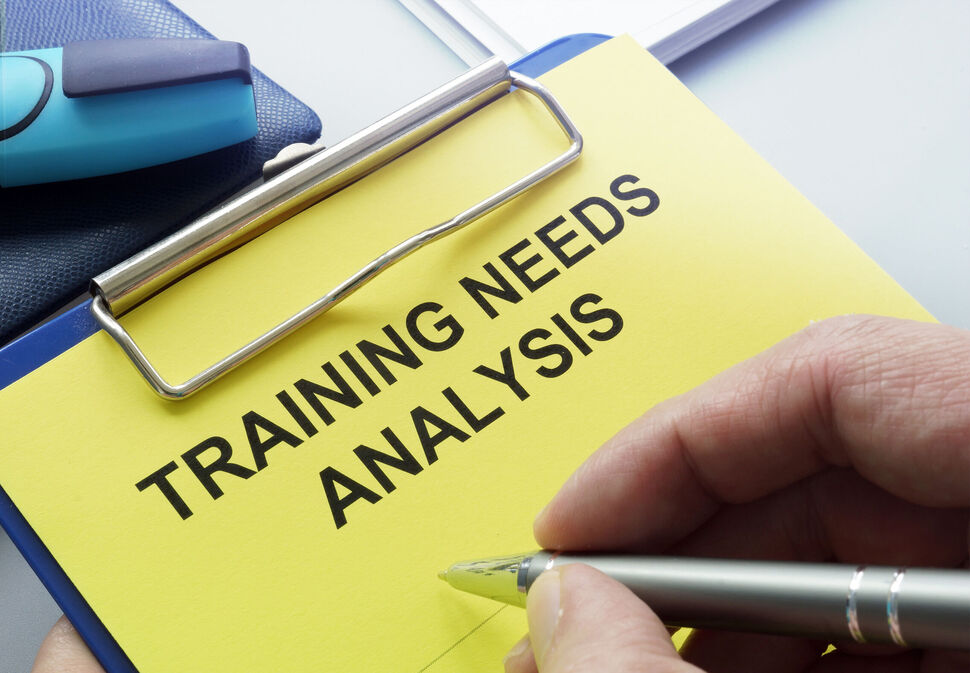 Sign with training needs analaysis